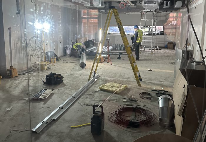 Construction workers inside the EMIoT.